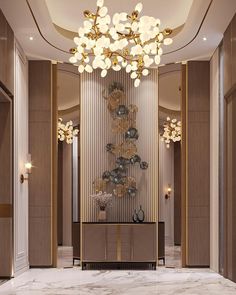 an elegant lobby with chandelier and marble flooring is seen in this rendering