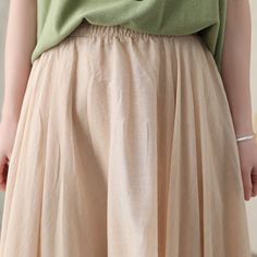 "you can wear it as a casual skirt for travelling, having a picnic with your friends, dating and shopping, Perfect for lazy days that you want to sustain a chic and stylish appearance. DETAIL * More colors available https://etsy.me/2T1UpyE * 75% linen, 25% cotton * Cotton liner * Elastic waistband * Without pockets * pleated waist detail * Plus size skirt * Circle skirt * Perfect summer spring skirt * Dry clean * The model is 170cm (5′7″) tall with a 80cm (31.5\") bust, 66cm (26\") waist. She is Casual Non-stretch Skirt With Elastic Waistband, Casual Skirted Skirt With Elastic Waistband, Casual Pleated Skirt With Elastic Waistband, Solid Color Midi Skirt For Beach, Beige Maxi Skirt With Elastic Waistband, Beige Casual Non-stretch Skirt, Casual Beige Pencil Skirt, Non-stretch Flared Beige Skirt, Non-stretch Beige Midi Skirt