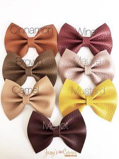 six different colors of bow ties with names on them