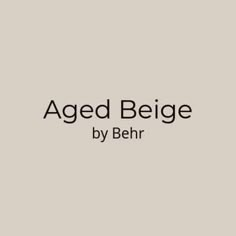 the words aged beige by behr are in black and white