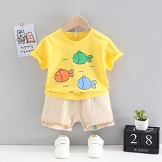 Grow Boy Cartoon Fish Patten Top & Solid Color Shorts - PrettyKid Playful Summer Sets With Cartoon Print, Cute Yellow Sets For Summer, Cute Yellow Summer Sets, Cute Yellow Summer Set, Summer Cotton Sets In Yellow, Yellow Cotton Sets For Summer, Summer Cotton Yellow Sets, Summer Yellow Cotton Sets, Playful Cartoon Print Shorts For Summer