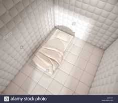 an empty room with white walls and tile flooring is shown in this 3d image