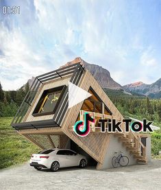 a car is parked in front of a tiny house