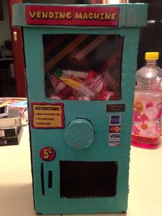 a vending machine sitting on top of a table