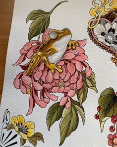 a drawing of a frog and flowers on white paper with gold trim around the edges