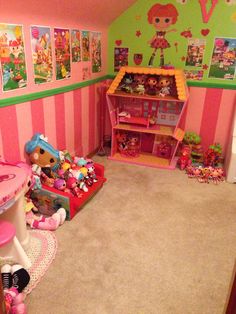 a child's playroom with toys in it