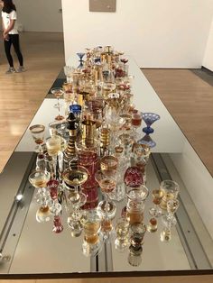 a table with many glasses on top of it