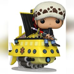 a pop vinyl figure sitting on top of a yellow toy boat with a pirate hat