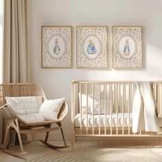 a baby's room with two pictures on the wall and a rocking chair next to it