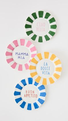 three colorful plates with the words mama mia and la dolce vita on them