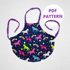 an apron with unicorns on it and the words, pattern is printed in purple