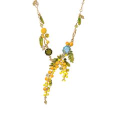 This thin necklace with a bunch of fruits and a carved crystal from the Provence Garden collection is elegant and refreshing. You will fall for the charm and beauty of the Provence, captured in this costume jewelry. The chain is made of brass gilded with 14 karat gold and is composed of translucent crystal beads and leaf pendants. Thin bunches of fruits are hanging in this scenery to create an incredibly realistic illusion. Two black and sky blue carved crystal beads are completing the graciousness of your necklace. All the elements are made of enamelled brass and 3D resin for your greatest pleasure.See description 45cm Length 4 cm Width 17g Weight Provence Garden, Fern Necklace, Unique Studs, Les Nereides, Costume Rings, Fancy Rings, Expensive Jewelry, Pearl Pendant Necklace, Leaf Pendant