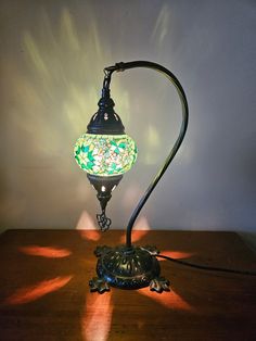 a lamp that is sitting on top of a table