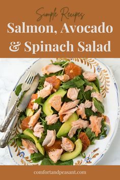 salmon, avocado and spinach salad on a plate