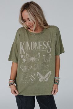 Your new favorite graphic tee just arrived, the Fluttering Kindness Graphic Tee, its the perfect boho touch! It will quickly become your go - to with all of your boho bottoms because it features: Comfortable, mineral - washed, Cotton tee shirt fabric for a vintage look and feel Loose and oversized tee shirt silhouette So cute "Kindness" with butterflies center graphic Classic round neckline and dropped shoulders with loose short sleeves Pair with: Eye Of The Sun Padded Bralette, Jules Bell Botto Kindness Graphic, Boho Bottoms, Boho Essentials, Oversized Tee Shirt, Shirt Silhouette, Bralette Outfit, Padded Bralette, Boho Aesthetic, Boho Shirts