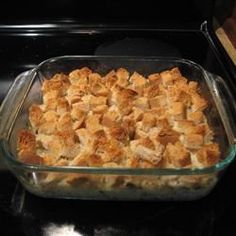 a casserole dish is sitting on top of the stove, ready to be eaten