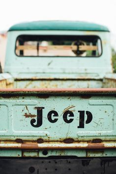 an old truck with the word jeep painted on it