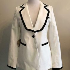 Nwt $458 William Rast Women's One-Button Blazer Size M White W/ Black Trim 27" From High Point Of Shoulder. Tailored For A Fitted Look. Sleeve Length: 32". Notch Lapel. Hidden Button & Loop Cuff. Besom Pockets. Double Vents. Hits At Waist. Cotton/Elastane/Poly. Lined. Dry Clean. Import. This Jacket Is New And Unworn With Tags. Designer White Blazer With Lapel Collar, Classic Tailored Blazer With Contrast Trim, White Tuxedo Style Fall Outerwear, White Tuxedo Style Outerwear For Fall, Designer White Blazer With Suit Collar, Elegant Workwear Blazer With Contrast Trim, Elegant Blazer With Contrast Trim For Work, Classic Tailored Outerwear With Contrast Trim, Classic Fall Blazer With Contrast Trim