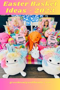 two stuffed animals sitting next to each other in front of a basket filled with toys