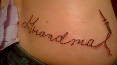 a woman's lower back tattoo with the word grandma written in cursive font