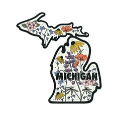 the michigan state shaped sticker with flowers and butterflies on it's back side