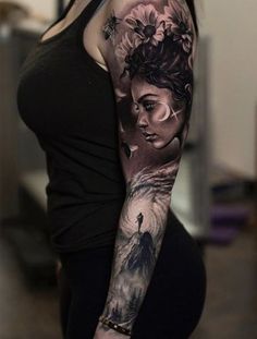 a woman with a tattoo on her arm