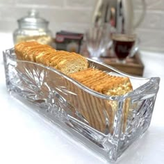 a loaf of bread sitting on top of a glass container