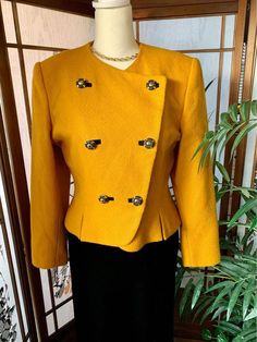 Vintage yellow Albert Nipon Jacket. Looks great worn open or closed. Great condition. Elegant Yellow Winter Blazer, Vintage Yellow Formal Blazer, Gold Double-breasted Outerwear For Fall, Yellow Vintage Blazer For Formal Occasions, Vintage Gold Blazer For Winter, Yellow Long Sleeve Blazer With Button Closure, Gold Vintage Blazer For Winter, Formal Vintage Yellow Outerwear, Yellow Blazer With Button Closure For Fall