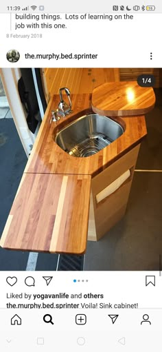 a wooden counter top with a sink and faucet in the middle, on instagram