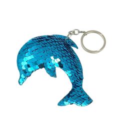 a dolphin keychain is shown on a white background