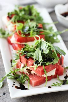 watermelon and feta salad on a white plate