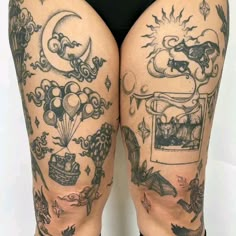 a woman's legs with tattoos on them