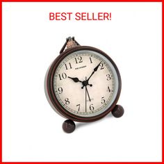 an alarm clock with the words best seller in red and white text below it,