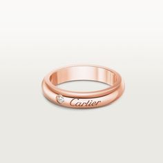 Cartier - C de Cartier wedding band - Ring Gold/Diamond - C de Cartier wedding band, 18K rose gold (750/1000), set with a brilliant-cut diamond of 0.03 carats. Width: 4 mm (for size 52). Please note that the carat weight, number of stones and product dimensions will vary based on the size of the creation you order. For detailed information please contact us. Cartier Wedding Band, Cartier Wedding Bands, Ring Gold Diamond, Groom Ring, Gold Band Ring, The C, Cartier Ring, Gold Wedding Band, Gold Diamond Rings