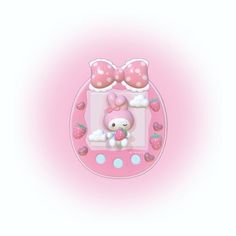 a pink hello kitty photo frame with two bows on it's head and an image of a bunny holding a strawberry in its mouth