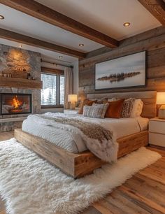 a bedroom with a bed and fireplace in it