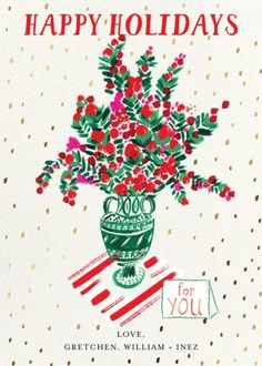 a holiday card with red flowers in a green vase