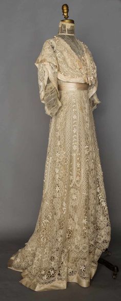 Ivory torchon lace in vertical rows, empire W, tulle neck insert & under-sleeves, trained skirt, B 32", W 21.5", L 60"-68", (light brown front stains, lining shredded, net undersleeves cut) very good. Edwardian Beauty, 1900s Costume, Divine Fashion, Edwardian Dresses, Historic Fashion, Battenburg Lace