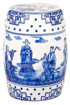 a blue and white vase with people on it