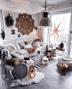 a living room filled with lots of furniture and decor