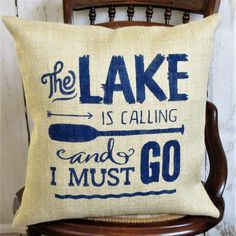 a pillow that says the lake is calling and i must go