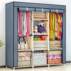 an open closet with clothes and handbags on the bottom shelf, in front of a white background