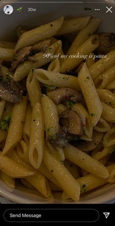 a bowl full of pasta with mushrooms and parmesan cheese on top, in the foreground is an email message