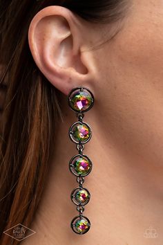 Featuring sleek gunmetal fittings, faceted rainbow gems gradually decrease as they trickle from the ear for a glamorous look. Earring attaches to a standard post fitting. Sold as one pair of post earrings. This Fan Favorite is back in the spotlight at the request of our 2021 Life of the Party member with Black Diamond Access, Brenda R. Why be cute? When you can be SuperCute 💋 Join SuperCute Bling360 on Facebook we would love for you to join us‼️ Glamorous Look, Multicolor Earrings, Oil Spill, Bracelet Display, Life Of The Party, The Ear, In The Spotlight, Jewelry Images, Paparazzi Accessories