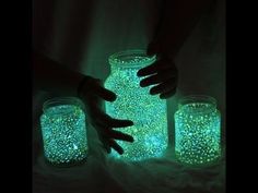 glow in the dark mason jars with hands and fingers on them, glowing green glitter