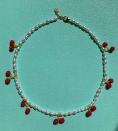 Necklace with freshwater pearls and handmade cherries made of glass beads.  Adjustable 925 sterling silver or gold plated 925 sterling silver lock Cherry Crochet, Denmark, Fresh Water, Charm Necklace, Freshwater Pearls, Seed Beads, Crochet Necklace, Glass Beads, Gold Plate