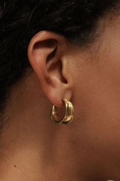 Carved minimal light weight hoop stud earrings. A unique take on a classic style. Gold Vermeil (14k gold over sterling silver) made with recycled materials. CARE: Most metals will naturally patina over time, however, there are measures you can take to prolong the life of your jewelry. We recommend removing all jewelry prior to showering, swimming, cleaning, or applying lotions or oils. If your jewelry begins to appear a dull or darkened, it can be gently polished with a soft jewelry cloth like S Ceramic Hoop Earrings, Gold Jewelry Inspiration, Mixed Metal Earring Stack, Gold Earrings Stack, Gold Hoop Earrings Aesthetic, Christmas Thrift, Statement Gold Earrings, Useful Objects, Chunky Gold Earrings