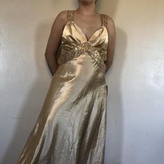 Sabrina Carpenter dress 
Gold satin maxi dress with sequins, 

Size 13/14. Model is a size small measurements in photos!

In good condition! No noticeable flaws minus light vintage wear and fabric 


#jessicamclintock #gunnesax #sabrina #partydress #golddress Sabrina Carpenter Dress, Dress With Sequins, Gold Satin, Dress Gold, Satin Maxi, Satin Maxi Dress, Gold Dress, Vintage Wear, Dress 100