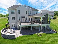 an aerial view of a large house in the country