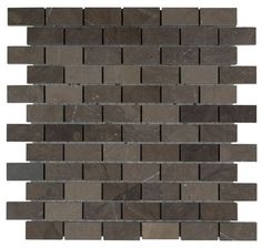 a black and gray tile wall with grey squares